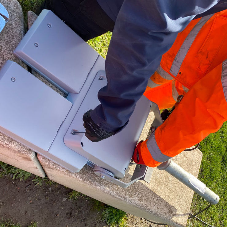 Electrician fitting an LED floodlight